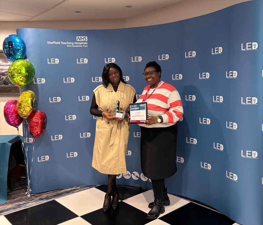The NIHR Sheffield BioResource Team, Ruth Yedu and Amarachukwu Chike-Onyeche, won the Community Impact Award at the Band 2 – 4 Celebration and Development Day.